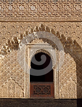 Morocco, Fez, Intricate medieval Islamic window and stucco surround photo