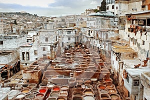 Morocco, Fez, the old city. Workers paint the skin in dyers. Medina. photo