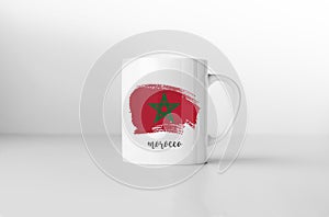 Morocco flag on white coffee mug.