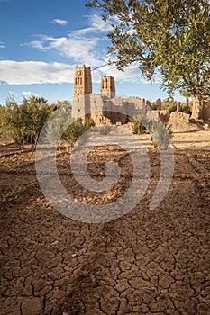 Morocco kasbah ruins with dry farmland
