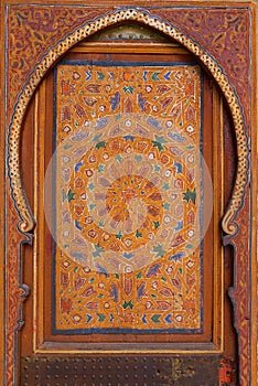 Morocco, Marrakesh. Detail of a medieval painted wooden door panel symmetrical Islamic - Arabesque style