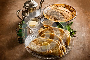 Morocco traditional breakfast with sello bread photo
