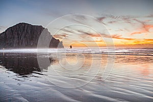 Morro bay rock and beach in the sunset evening photo