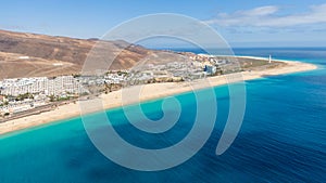 Morro Jable Canary Island, Fuerteventura Spain, Aerial view on coast of atlantic ocean and beach, Drone shot of sea