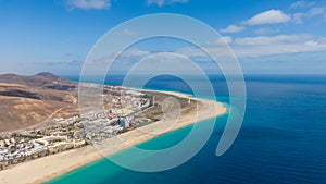 Morro Jable Canary Island, Fuerteventura Spain, Aerial view on coast of atlantic ocean and beach, Drone shot of sea