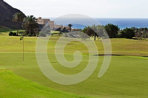 Morro Jable golf course in the south of Fuerteventura with the sea in the background