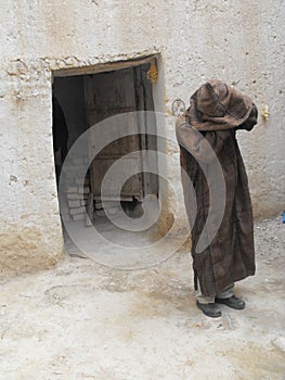 Morrocan man in traditional dress in Taghjijt village