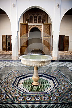 Morrocan mosaic floor and wooden door