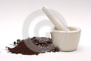 Mortar, coffee beans and grind photo