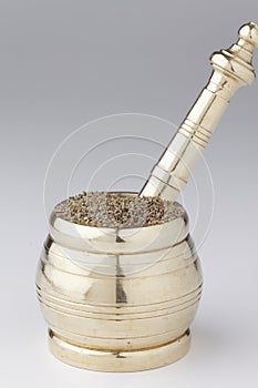 Mortar and pestle with Bishop's weed.