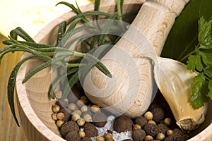 Mortar and pestle, with fresh-picked herbs