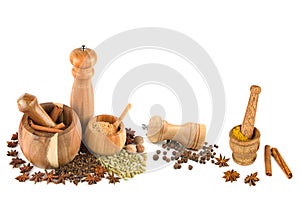 Mortar with pestle, hand mill and spices set isolated on white . Collage