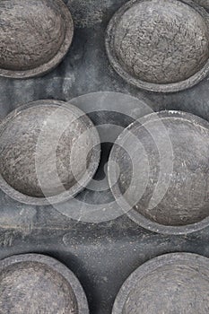 Mortar and pestle, made of stone, tools for grinding traditional Indonesian cooking spices which are widely photo