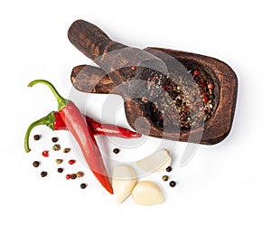 Mortar And Pestle With Pepper And Spices