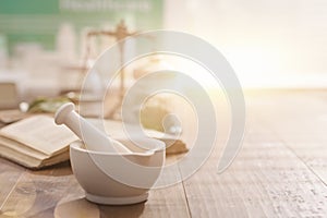 Mortar and pestle on the pharmacist`s table