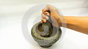 Mortar and pestles or lesung batu in Malay on a isolated white background