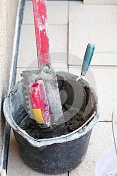 Mortar on wall construction notched trowel