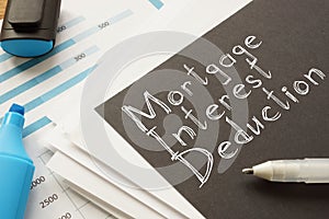 Mortgage Interest Deduction is shown on the conceptual business photo