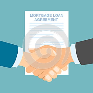 Mortgage loan agreement handshake.