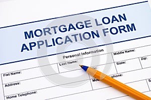 Mortgage Loan application form with pen