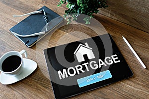 Mortgage online application form on device screen. Business and finance concept.