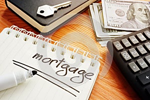 Mortgage is shown on the conceptual business photo