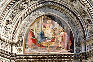 Christ enthroned with the Mother of God and Saint John the Baptist. Cathedral of Santa Maria del Fiore. Facade. Florence. Italy.