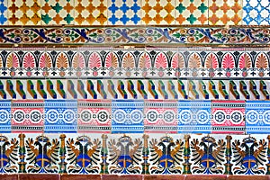 Mosaic of ancient colorful azulejos (spanish ceramic tiles)