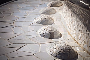 Mosaic bench in Park Guell by architect Antoni Gaudi, Barcelona, Spain.