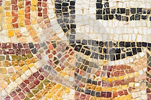 Mosaic close-up in brown yellow colors