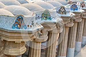 Mosaic colonnade at park Guell in Barcelona photo