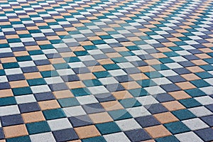 Mosaic of color paving stones. Beautiful abstract background.City path, the area of stone