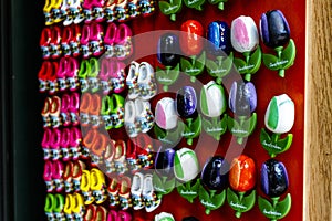 Mosaic of colorful magnets clogs and tulips of Holland for sale, Amsterdam, The Netherlands