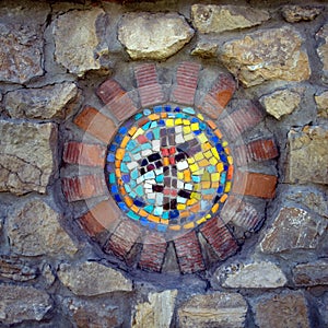 Mosaic depicting an Orthodox cross on the wall of the temple of all religions