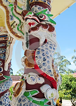 Mosaic dragon on a column