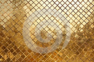 Mosaic made of gold tiles, background photo