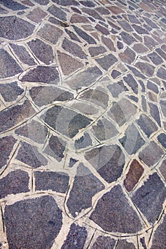 Mosaic pattern of a stone pavement or sidewalk
