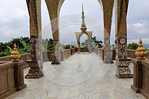 Mosaic pillars and passageway on one of the levels of the temple at Pha Sorn Kaew, Khao Kor, Phetchabun, Thailand