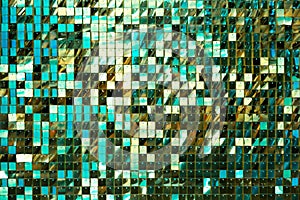 Mosaic shiny tiled abstract background geometric texture from green golden squares