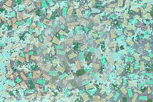 Mosaic stone wall of multi-colored polygons