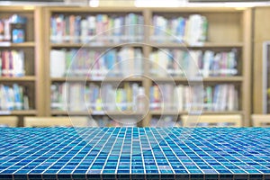 Mosaic table with library blur background