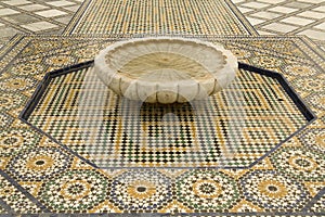 Mosaic tiles and fountain