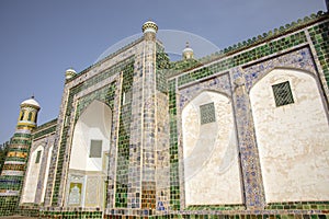 Mosaic tiles and minarets on front of the Muausoleum of Apak Koja, Kashgar, China photo