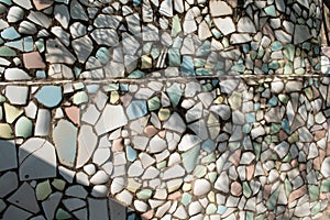 Mosaic wall made from broken ceramic material at the Rock Garden of Chandigarh in Chandigarh, Punjab, India