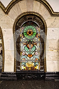 Mosaic window in the interior of a Metro station in Moscow Russia