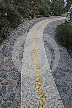 A mosaic yellow brick road at the Eden Project in Cornwall, England photo