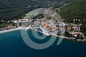 Moscenicka draga bay and long natural grit sand beach air photo in Croatia