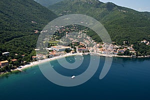 Moscenicka draga bay and long natural grit sand beach air photo in Croatia