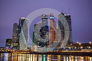 Moscow City skyscraper buildings with windows night view.