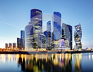 Moscow City skyline.  International Business Centre at night time with Moskva river